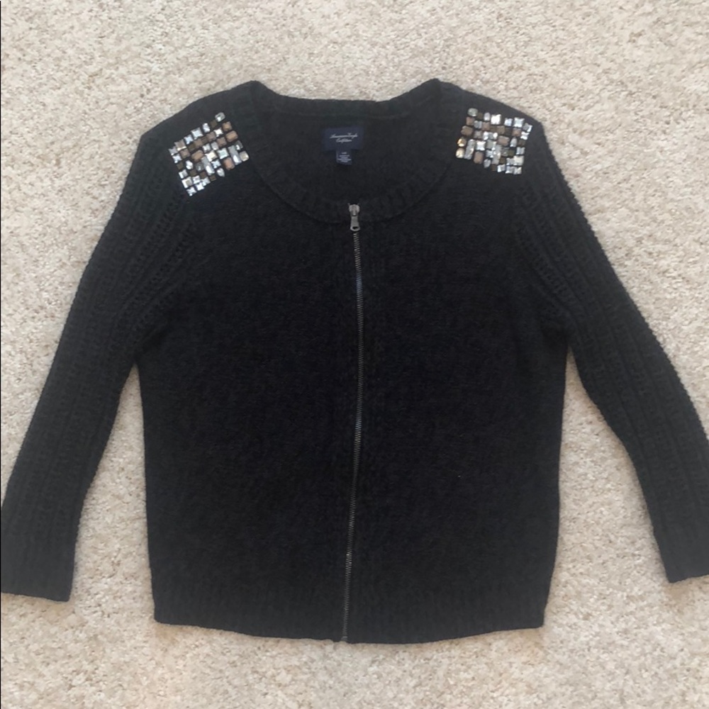 Dark grey sweater with embellishment
